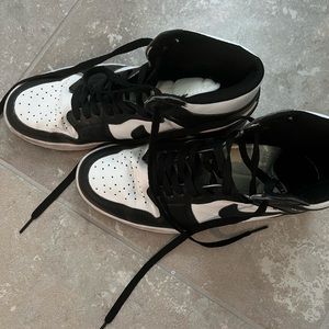 Black and white hightop Nikes
